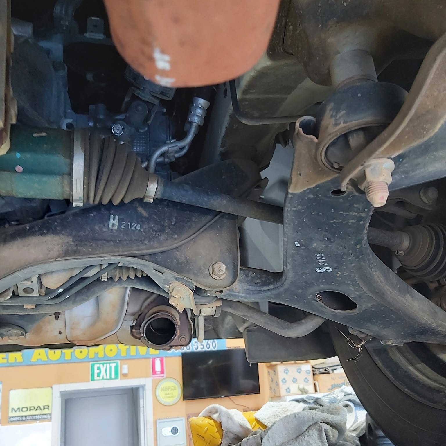A vehicle raised on the hoist inside the Baker Automotive workshop in Stawell